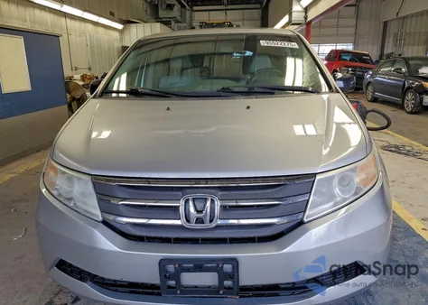 2012 Honda Odyssey Exl z USA, uszkodzony, nr VIN 5FNRL5H66CB028914